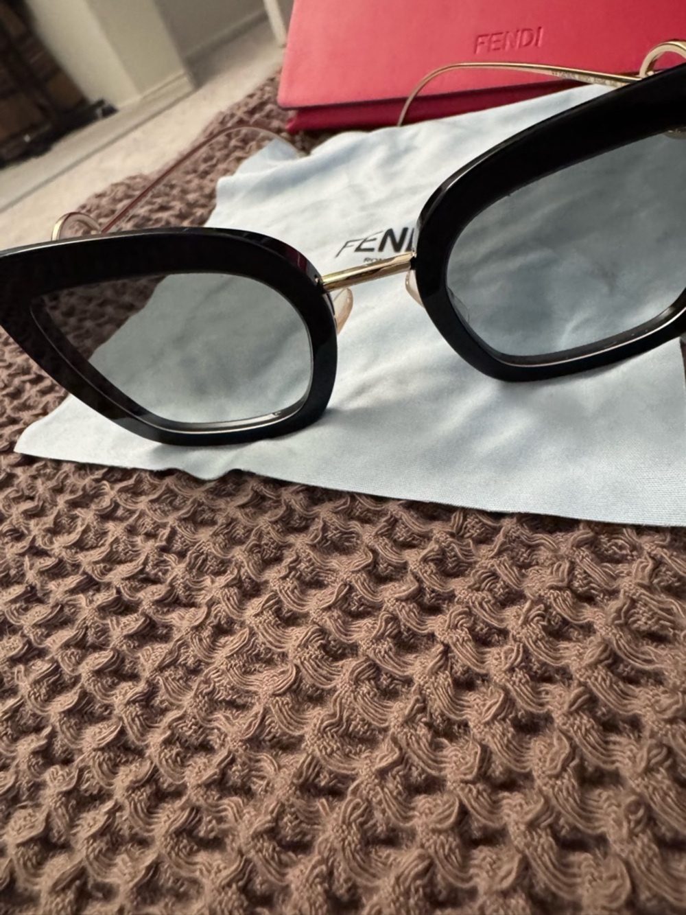Fendi Black Cat-Eye Sunglasses with Gold Logo Temples